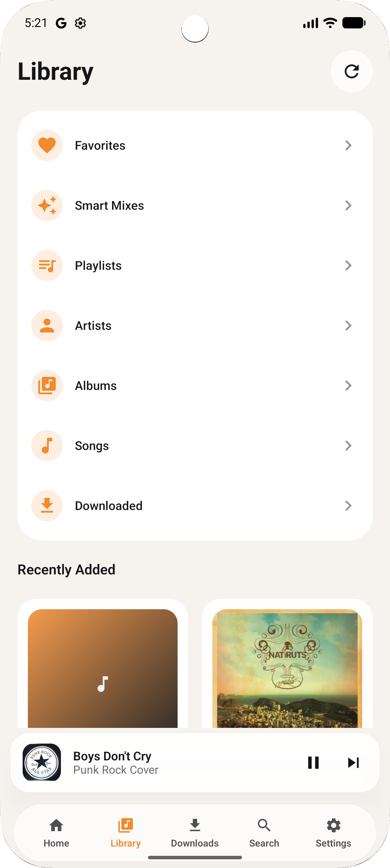JellyAmp on Android — Library screen with Favorites, Smart Mixes, Playlists, Artists, Albums, Songs, Downloaded